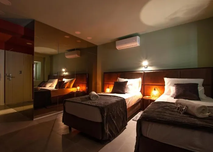 X Boutique Marinac & *