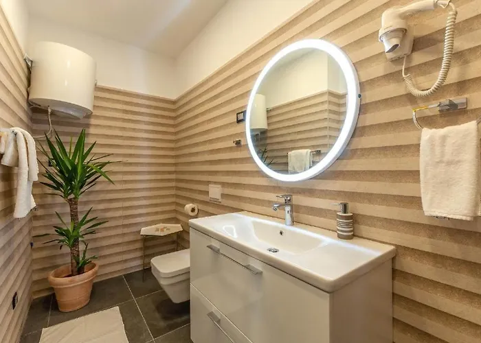 X Boutique Marinac & Apartman *