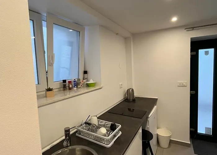 X Boutique Marinac & *