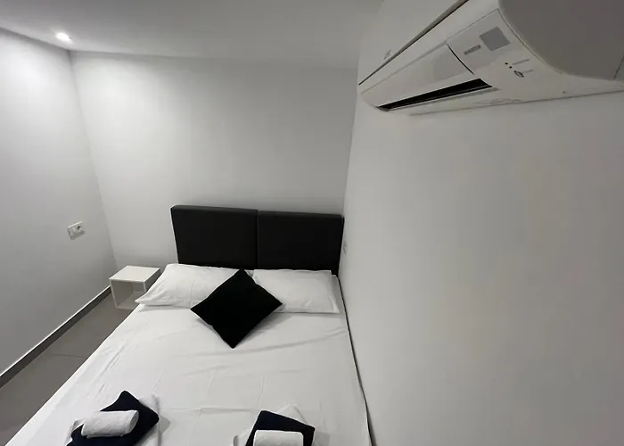 X Boutique Marinac & Apartman *